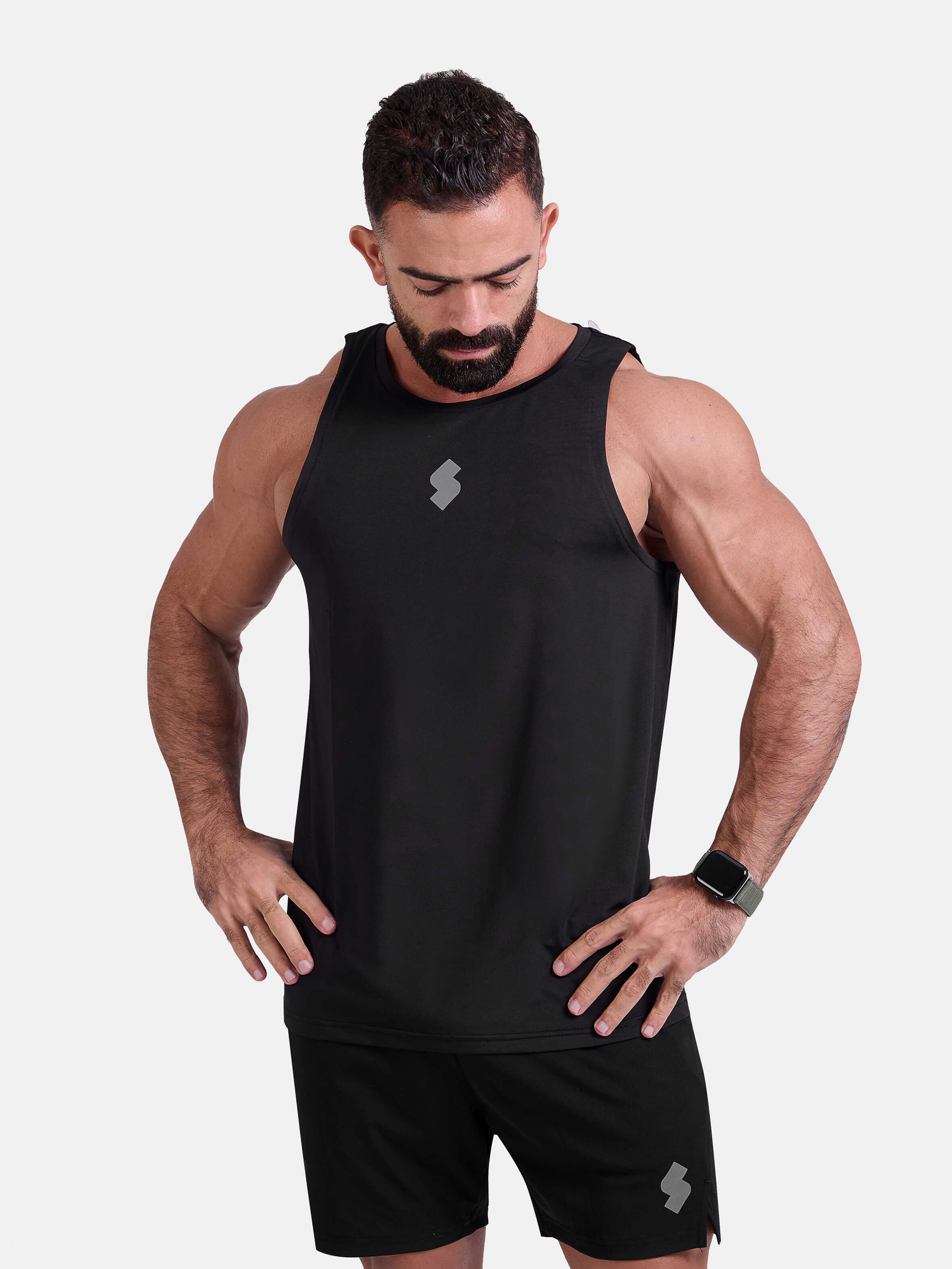 Man wearing black sports & gym tank top by KAF