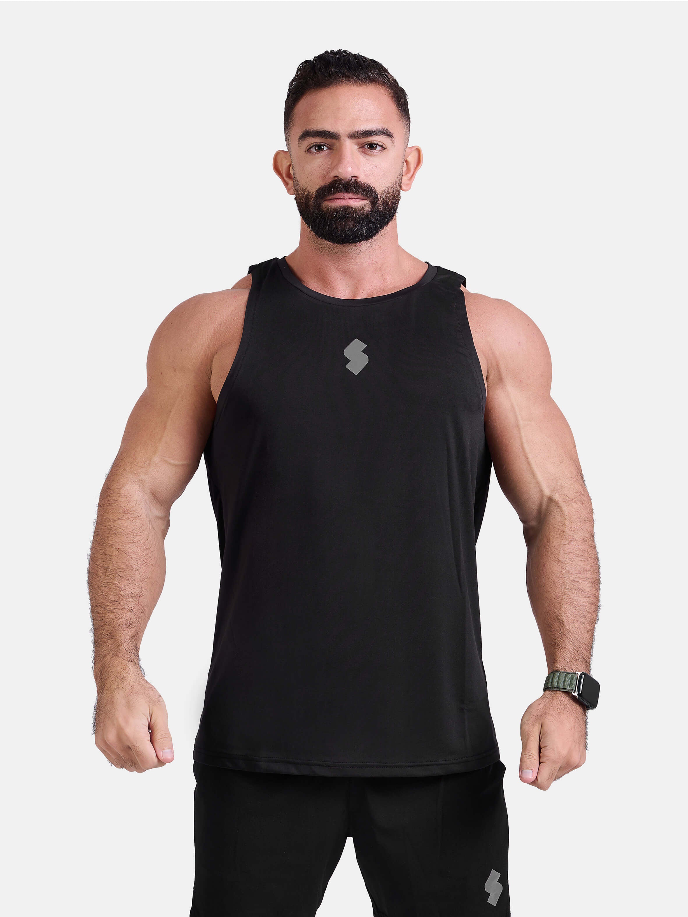 Man wearing black sports & gym tank top by KAF