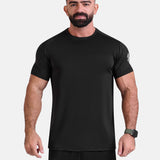 Man wearing black sports - gym - padel t-shirt by KAF Egypt