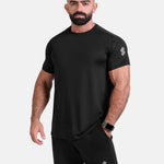 Man wearing black sports - gym - padel t-shirt by KAF Egypt