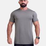 Man wearing sage sports - gym - padel t-shirt by KAF Egypt