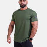Man wearing green sports - gym - padel t-shirt by KAF Egypt