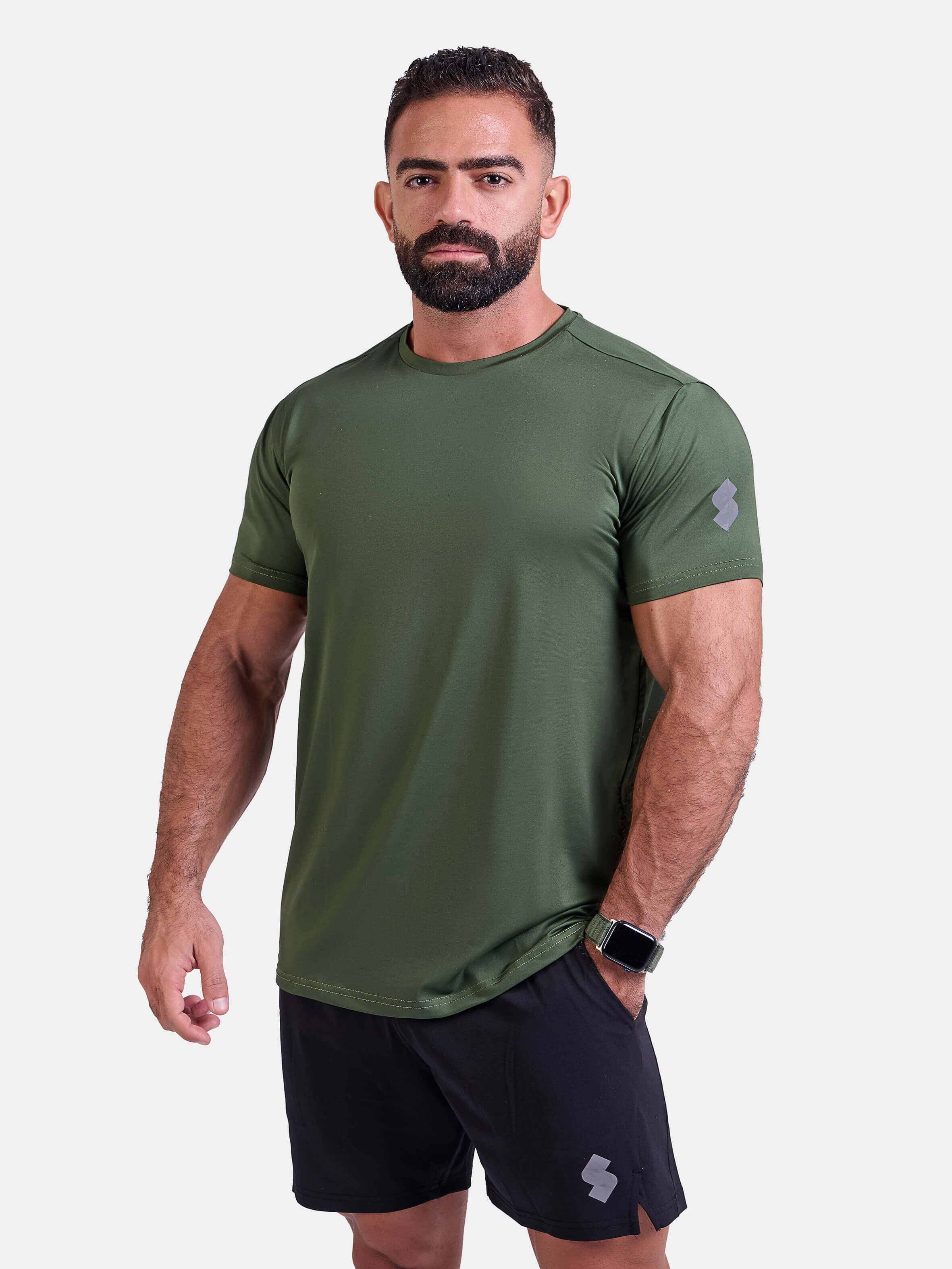 Man wearing green sports - gym - padel t-shirt by KAF Egypt