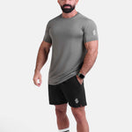 Man wearing sage sports - gym - padel t-shirt by KAF Egypt