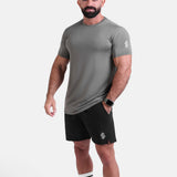 Man wearing sage sports - gym - padel t-shirt by KAF Egypt