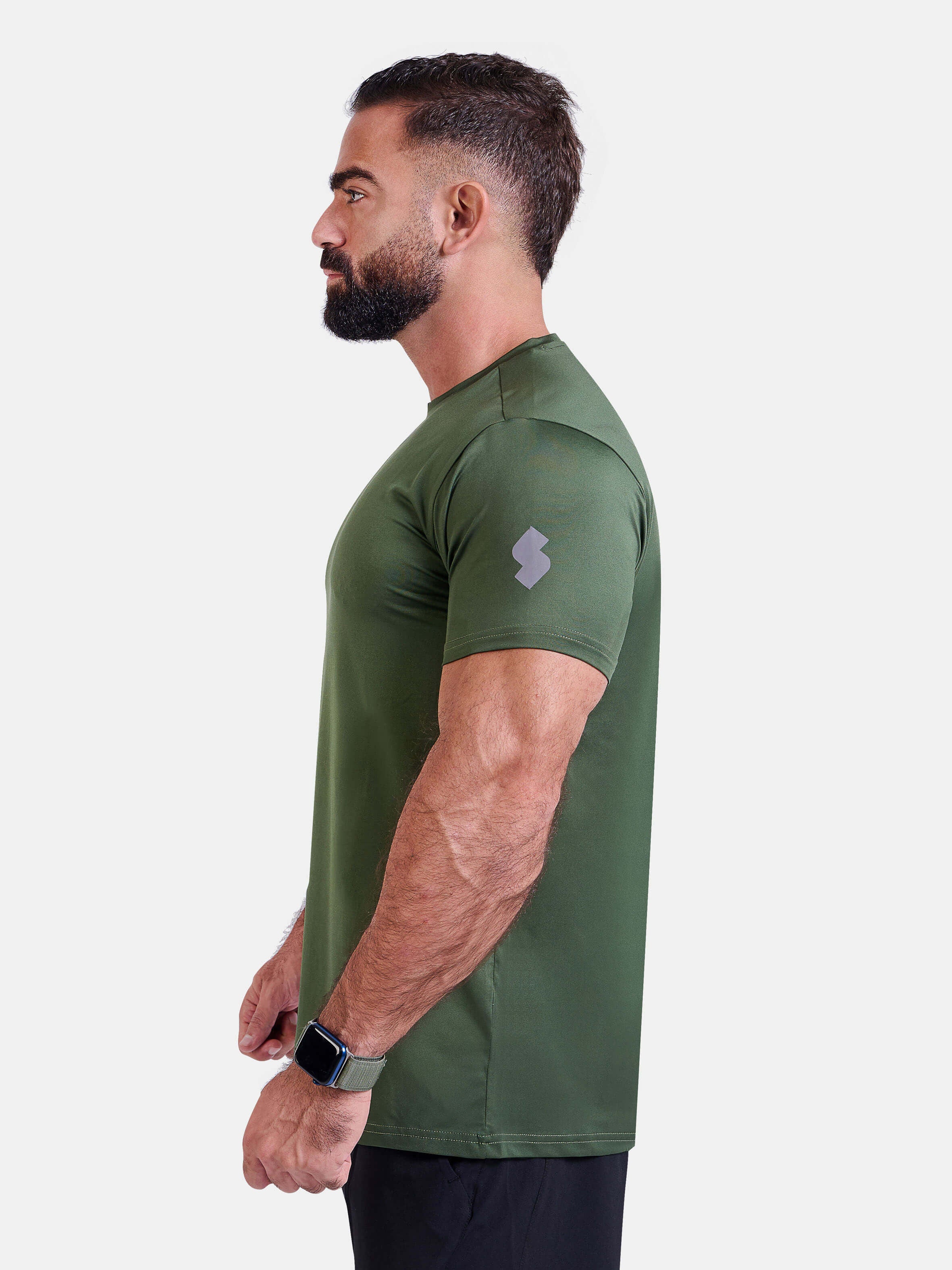 Man wearing green sports - gym - padel t-shirt by KAF Egypt