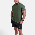 Man wearing green sports - gym - padel t-shirt by KAF Egypt