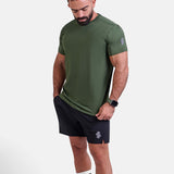 Man wearing green sports - gym - padel t-shirt by KAF Egypt