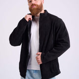 Man wearing a black corduroy jacket by KAF on a white background