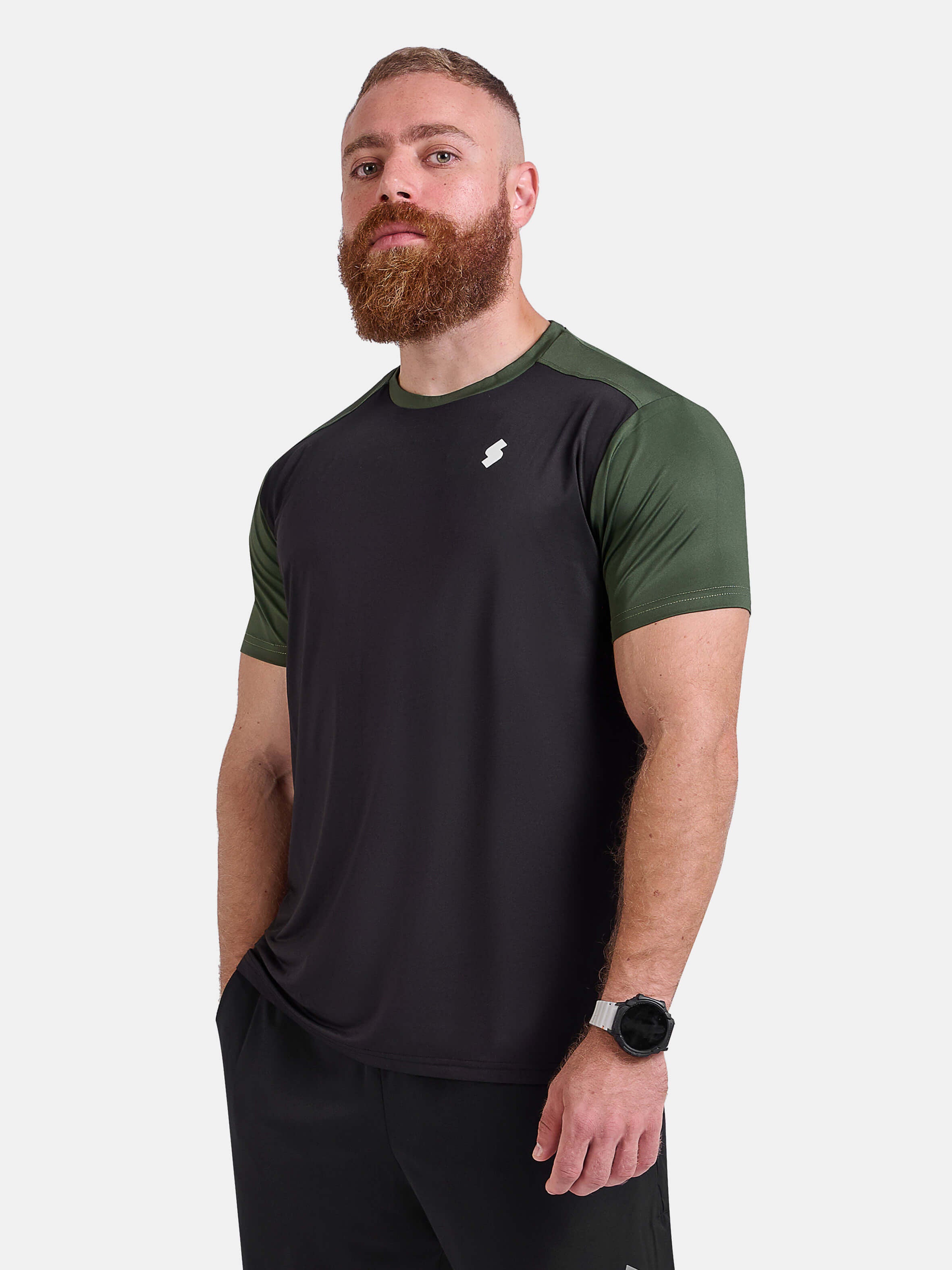 Man wearing black and green sports - gym - padel t-shirt by KAF Egypt