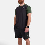 Man wearing black and green sports - gym - padel t-shirt by KAF Egypt