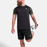 Man wearing black and green sports - gym - padel t-shirt by KAF Egypt