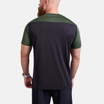 Man wearing black and green sports - gym - padel t-shirt by KAF Egypt