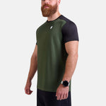 Man wearing black and green sports - gym - padel t-shirt by KAF Egypt