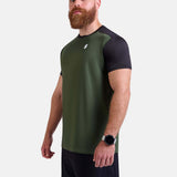 Man wearing black and green sports - gym - padel t-shirt by KAF Egypt