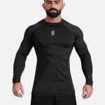 Man wearing black sports & gym rashguard shirt by KAF