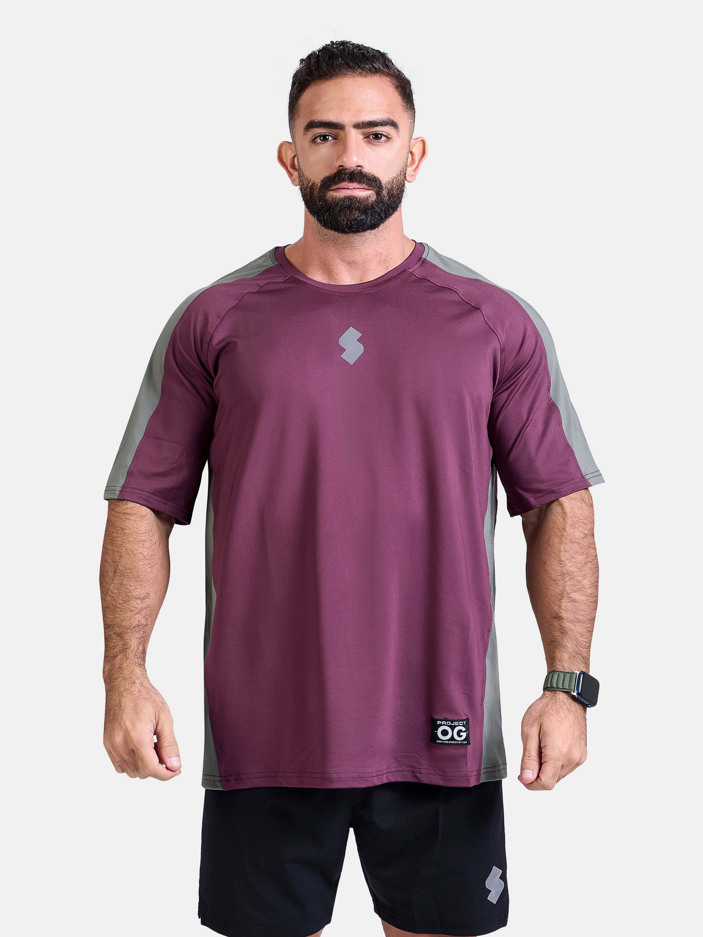 Man wearing a burgundy oversized sports & gym shirt by KAF