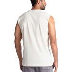Man wearing a white sleeveless shirt on a white background