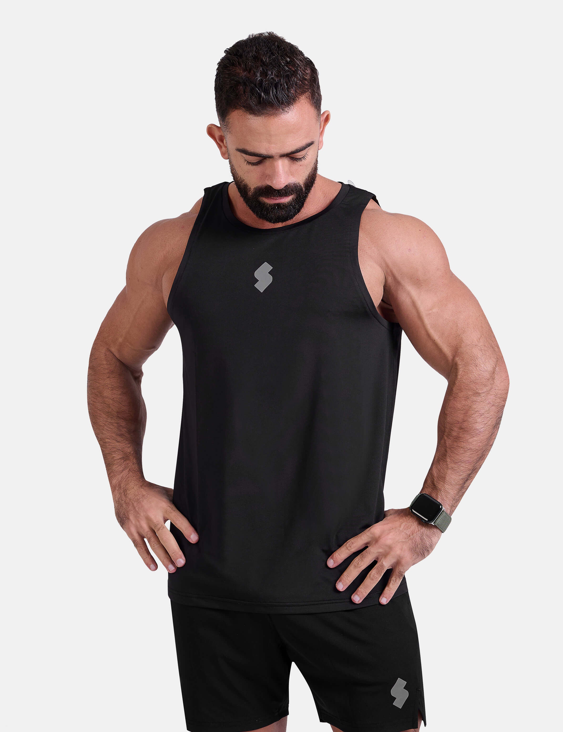 Man wearing black sports & gym tank top by KAF 