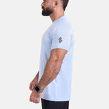 Man wearing light blue sports - gym - padel t-shirt by KAF Egypt