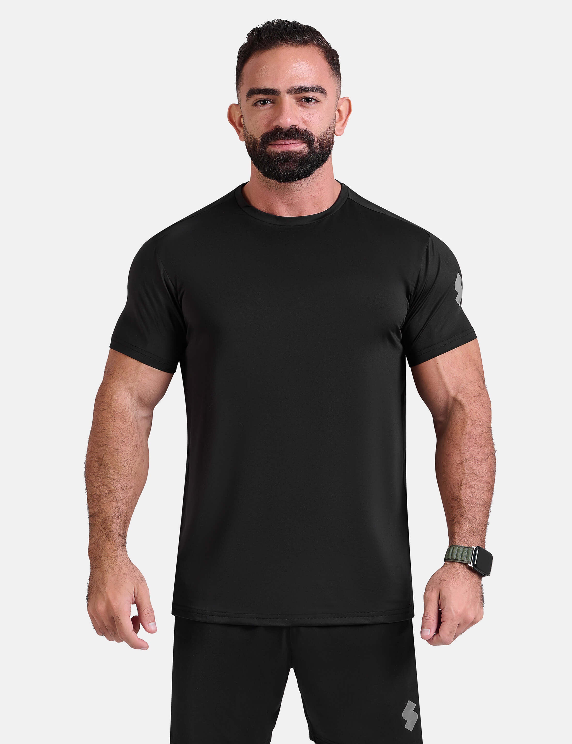 Man wearing black sports - gym - padel t-shirt by KAF Egypt