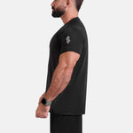 Man wearing black sports - gym - padel t-shirt by KAF Egypt
