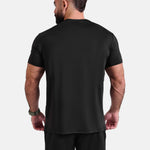 Man wearing black sports - gym - padel t-shirt by KAF Egypt