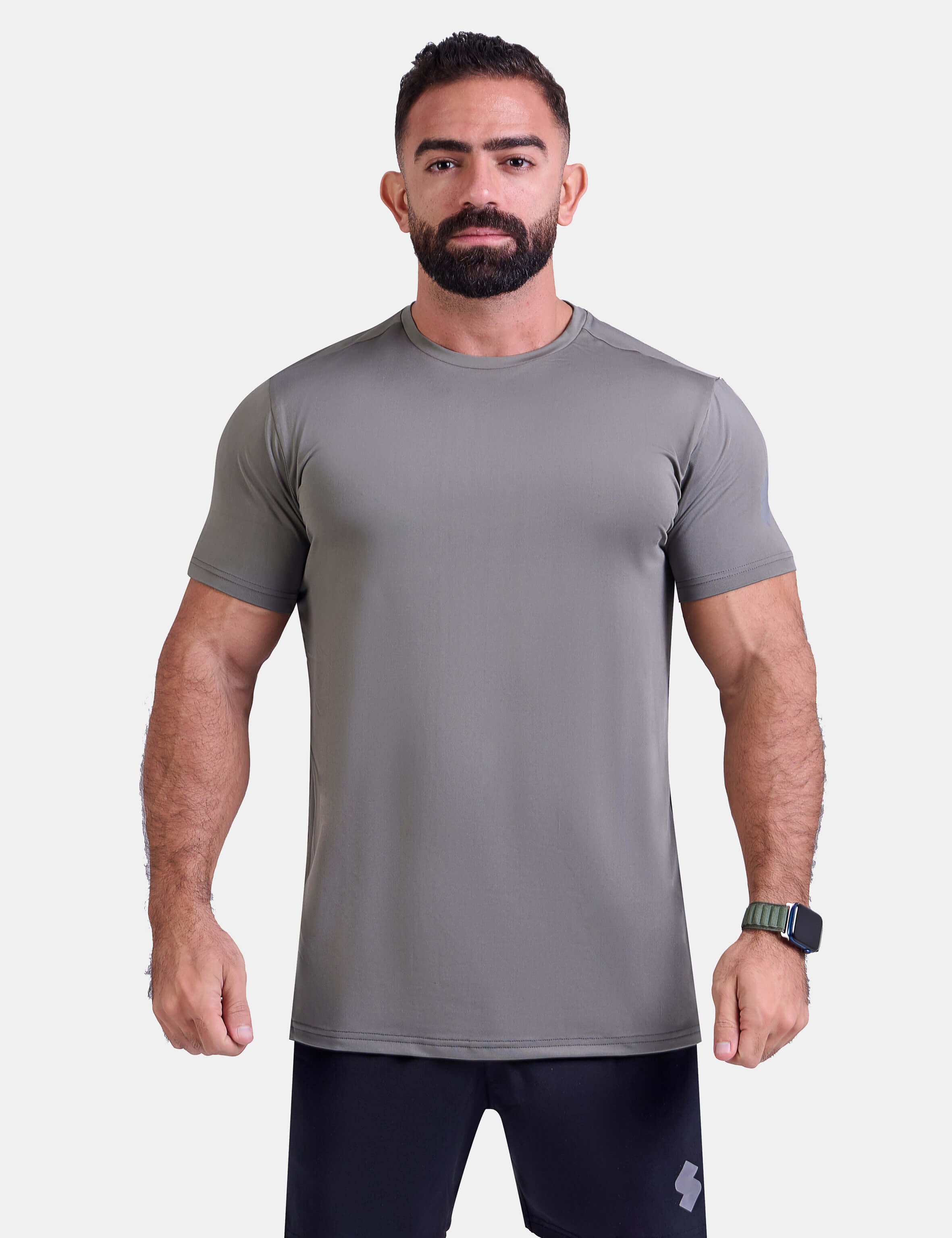 Man wearing sage sports - gym - padel t-shirt by KAF Egypt