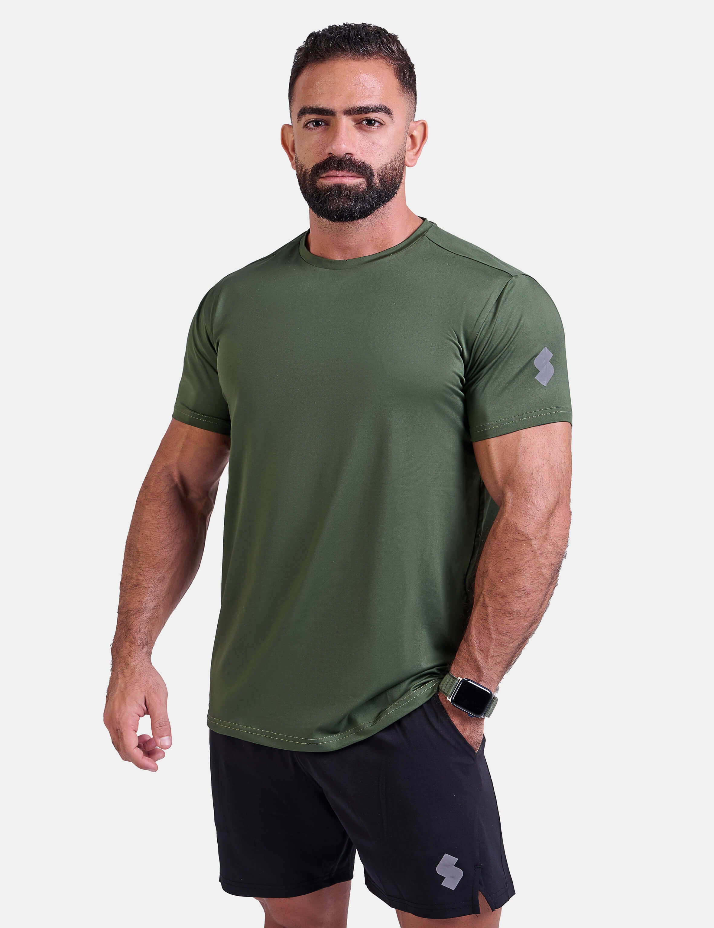 Man wearing green sports - gym - padel t-shirt by KAF Egypt