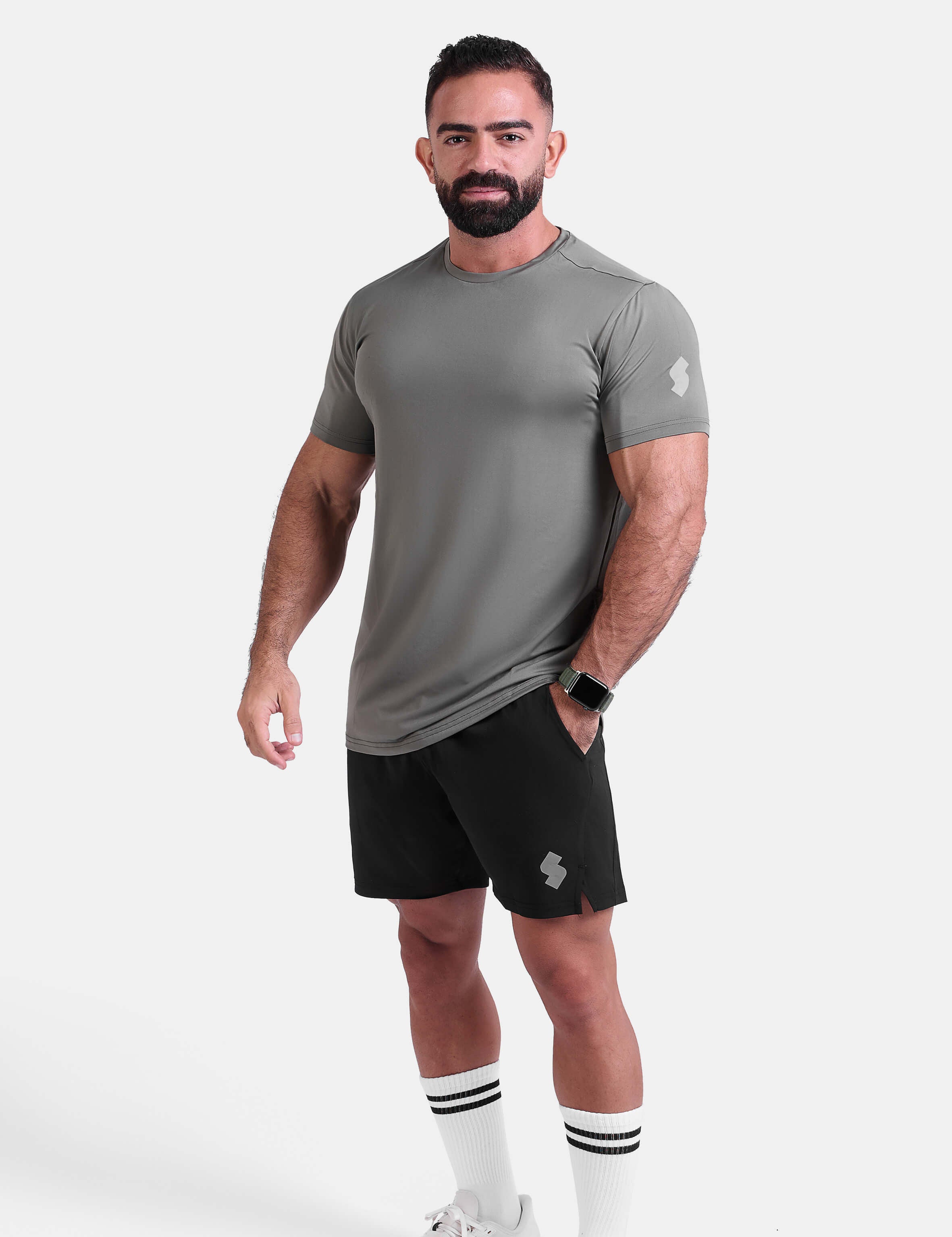 Man wearing sage sports - gym - padel t-shirt by KAF Egypt