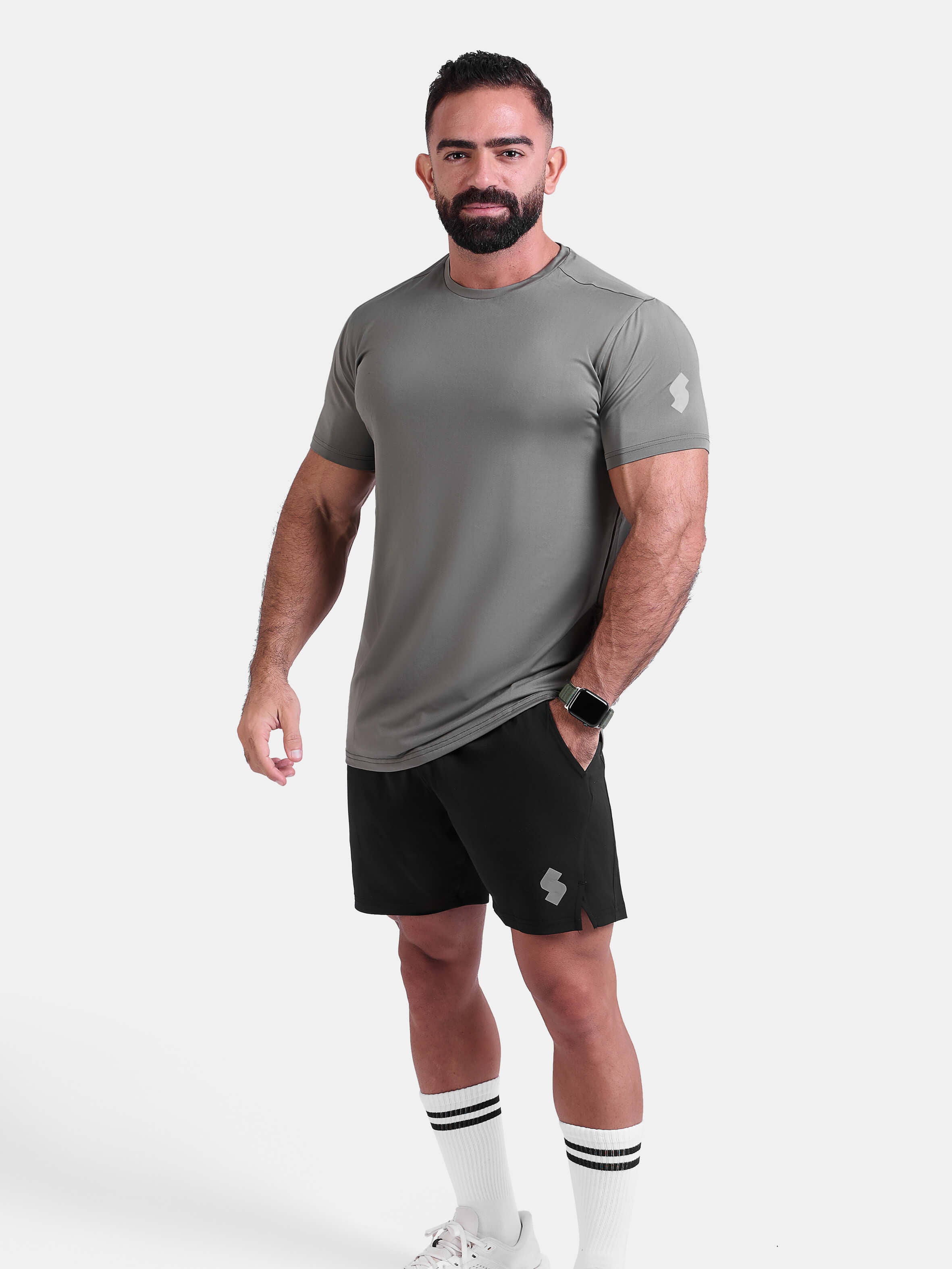 Man wearing sage sports - gym - padel t-shirt by KAF Egypt