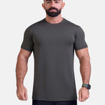 Man wearing dark gray sports - gym - padel t-shirt by KAF Egypt