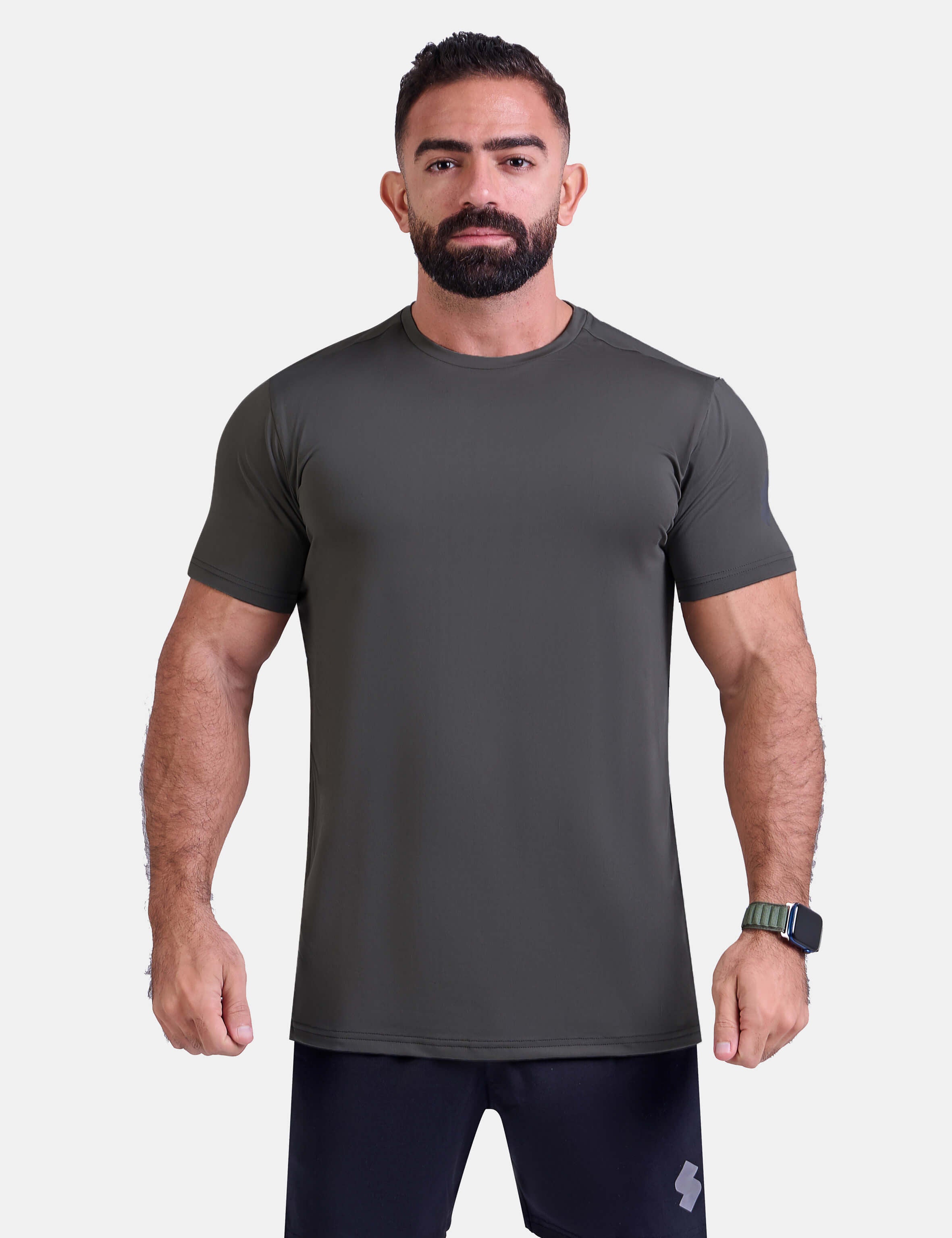 Man wearing dark gray sports - gym - padel t-shirt by KAF Egypt