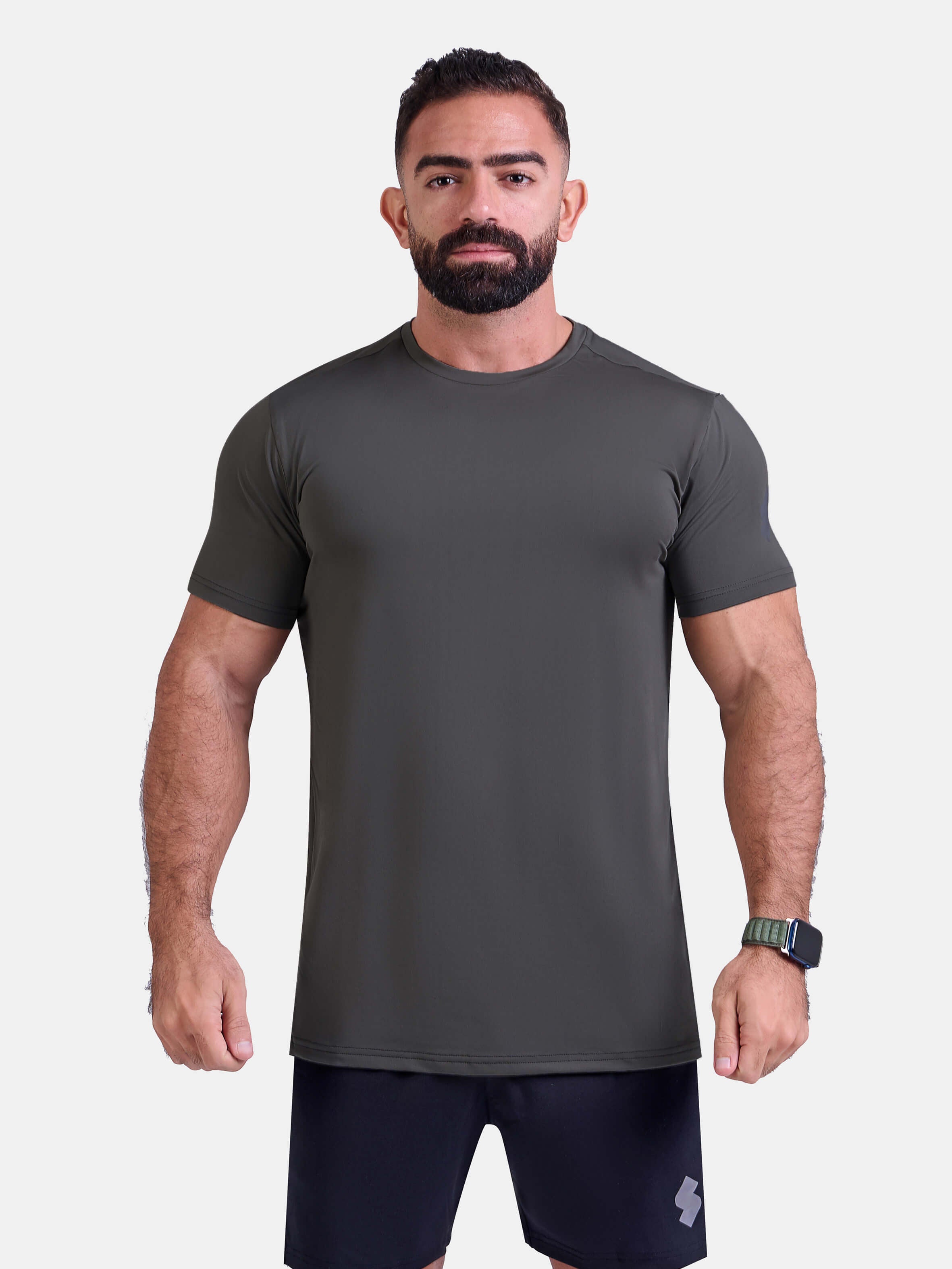 Man wearing dark gray sports - gym - padel t-shirt by KAF Egypt