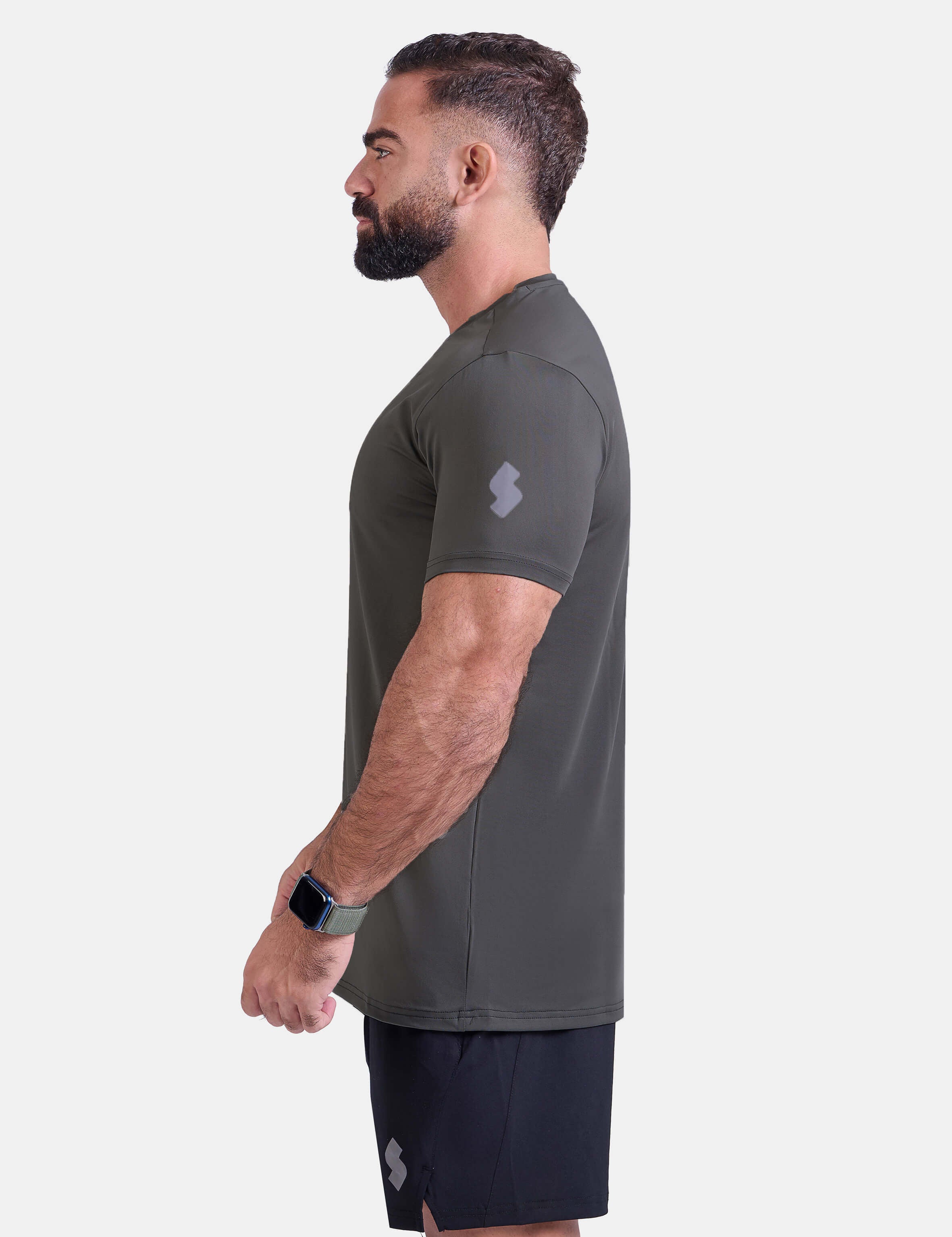Man wearing dark gray sports - gym - padel t-shirt by KAF Egypt