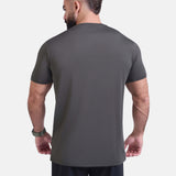 Man wearing dark gray sports - gym - padel t-shirt by KAF Egypt