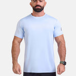 Man wearing light blue sports - gym - padel t-shirt by KAF Egypt