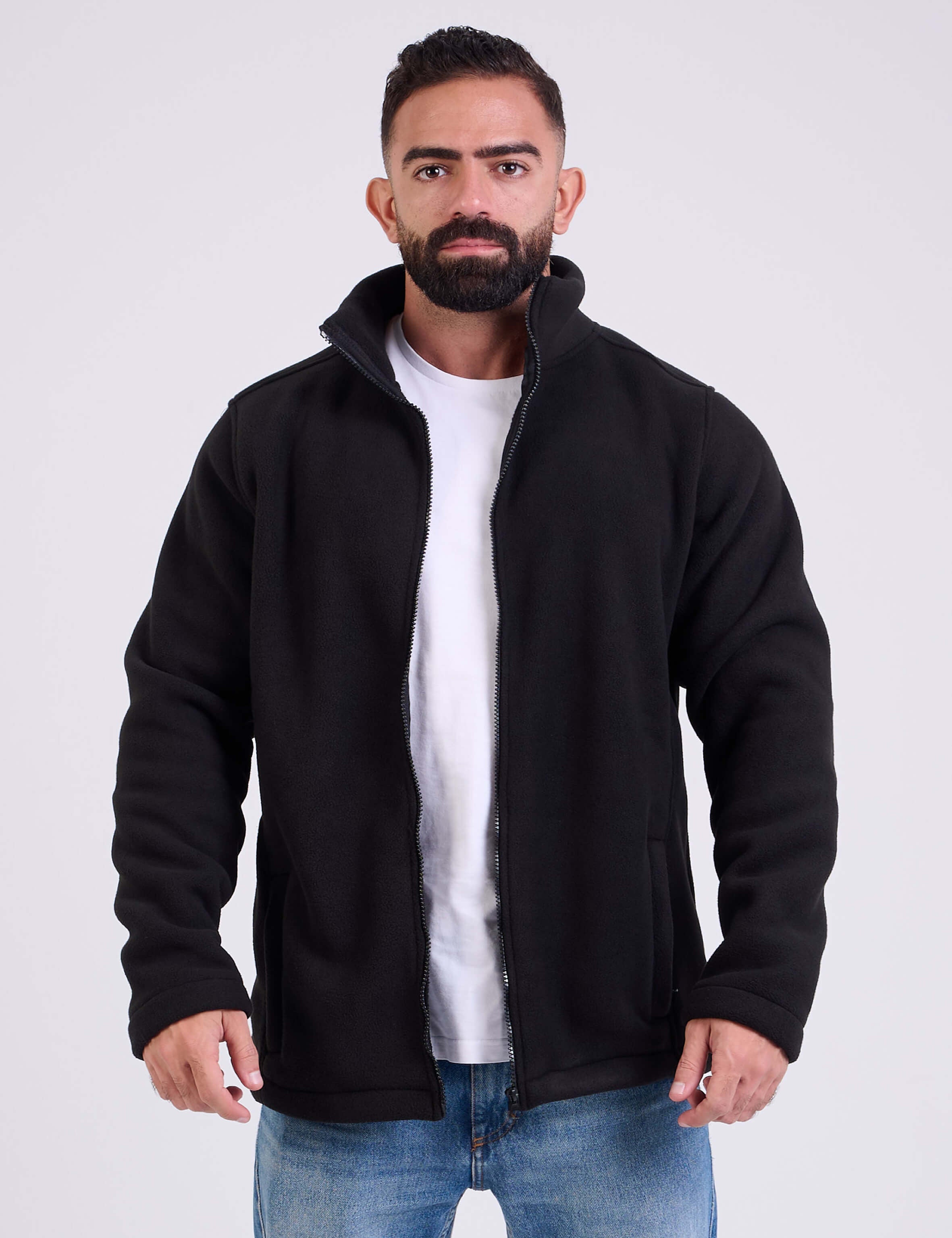 Man wearing a black fleece jacket by KAF on a white background. Made in Egypt
