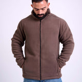 Man wearing a brown fleece jacket by KAF on a white background. Made in Egypt