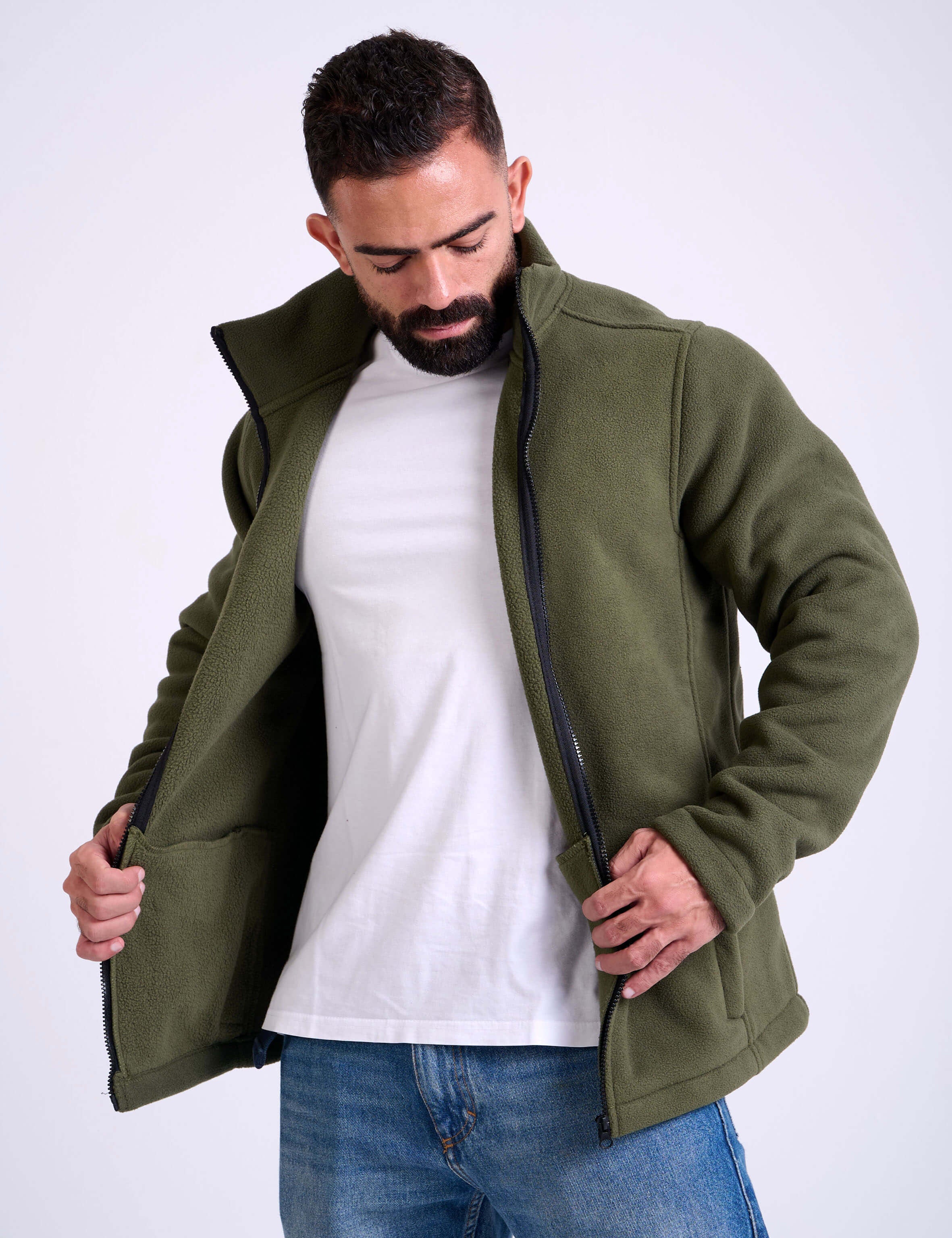 Man wearing a olive fleece jacket by KAF on a white background. Made in Egypt