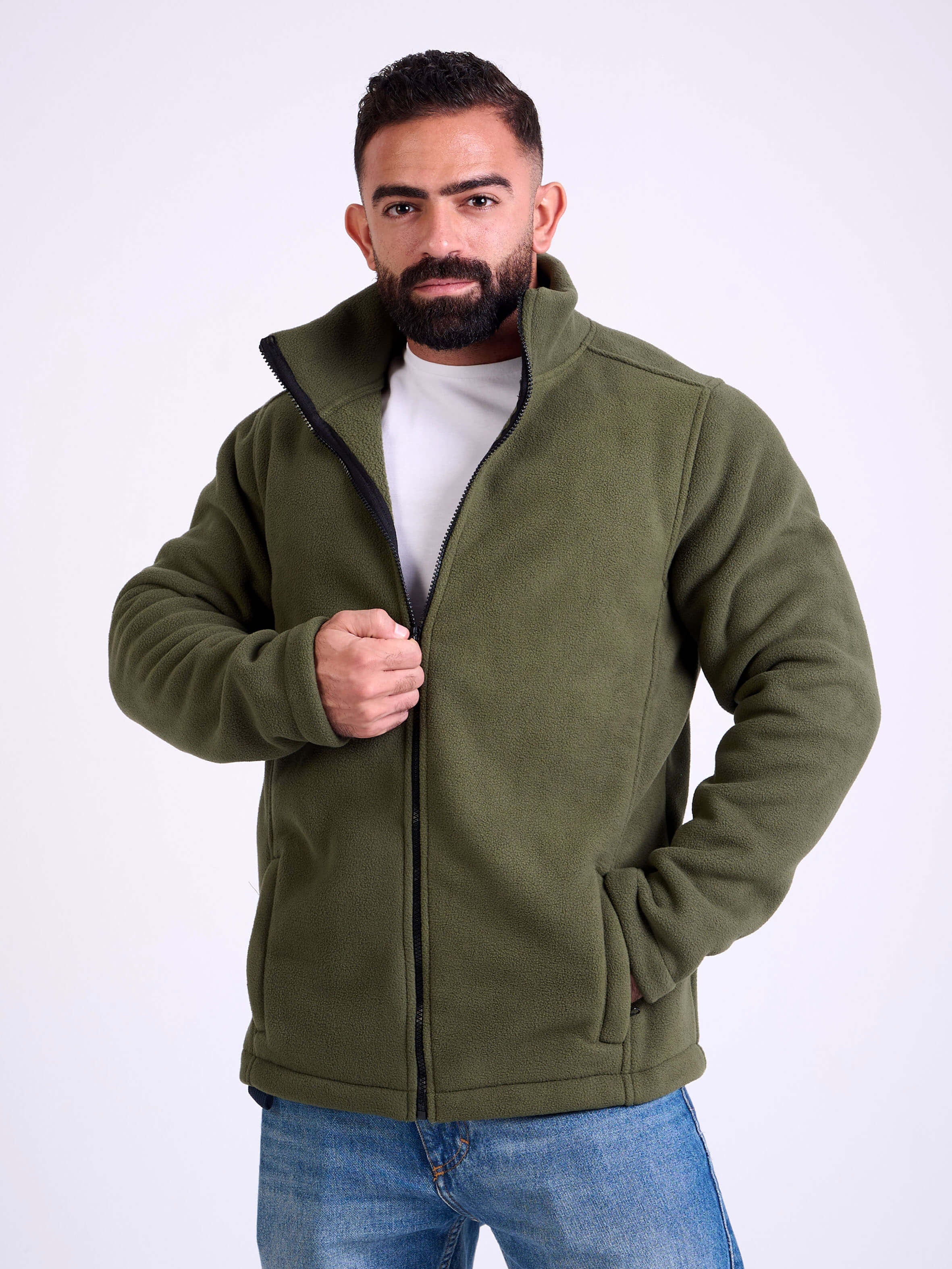 Man wearing a olive fleece jacket by KAF on a white background. Made in Egypt