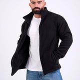 Man wearing a black fleece jacket by KAF on a white background. Made in Egypt