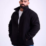 Man wearing a black fleece jacket by KAF on a white background. Made in Egypt