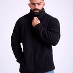 Man wearing a black fleece jacket by KAF on a white background. Made in Egypt