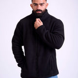 Man wearing a black fleece jacket by KAF on a white background. Made in Egypt