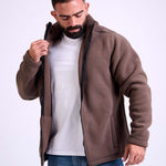 Man wearing a brown fleece jacket by KAF on a white background. Made in Egypt