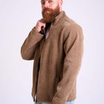 Man wearing a camel beige corduroy jacket by KAF on a white background