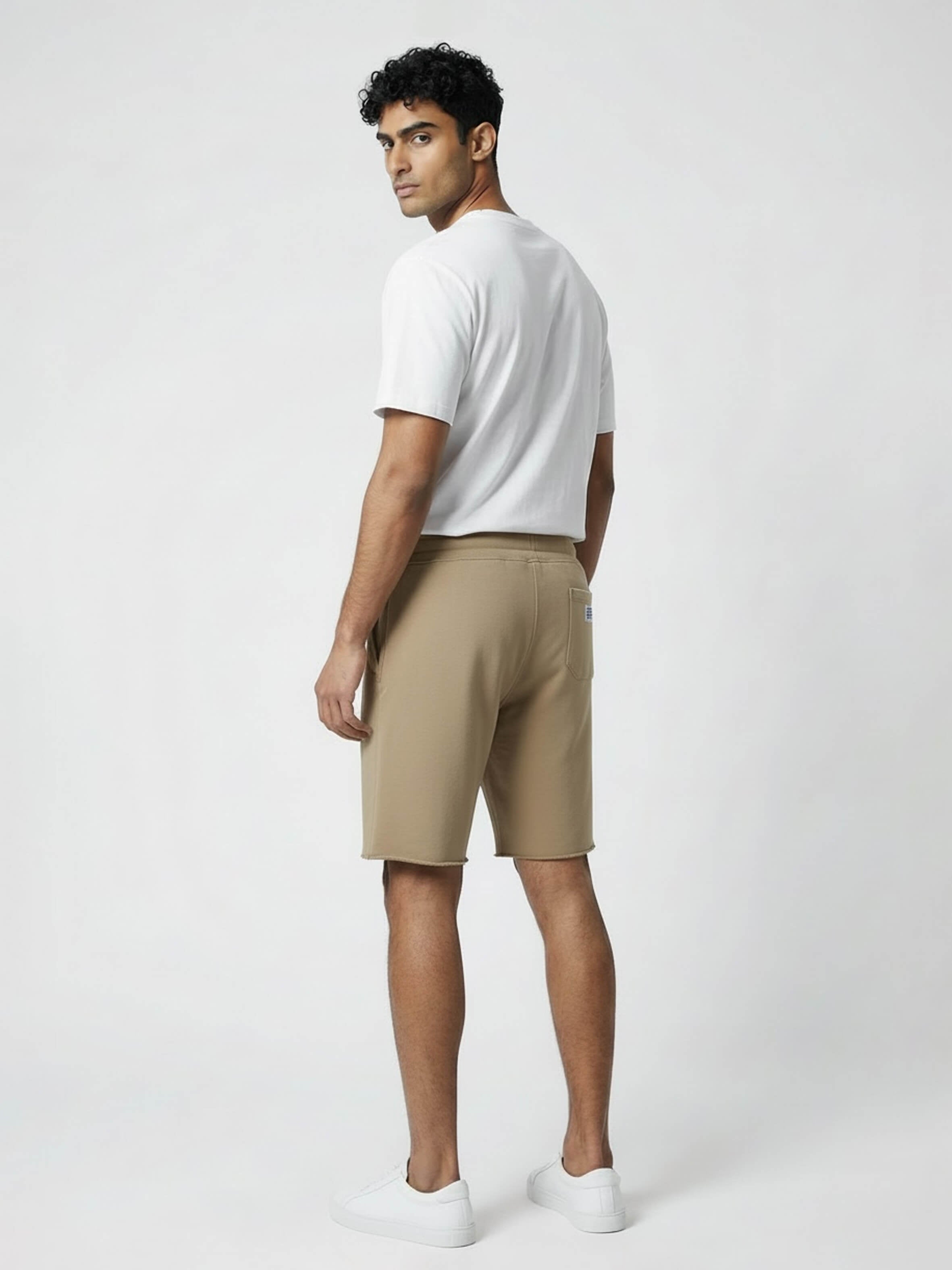Man wearing cotton beige sweatshorts by KAF