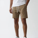 Man wearing cotton beige sweatshorts by KAF
