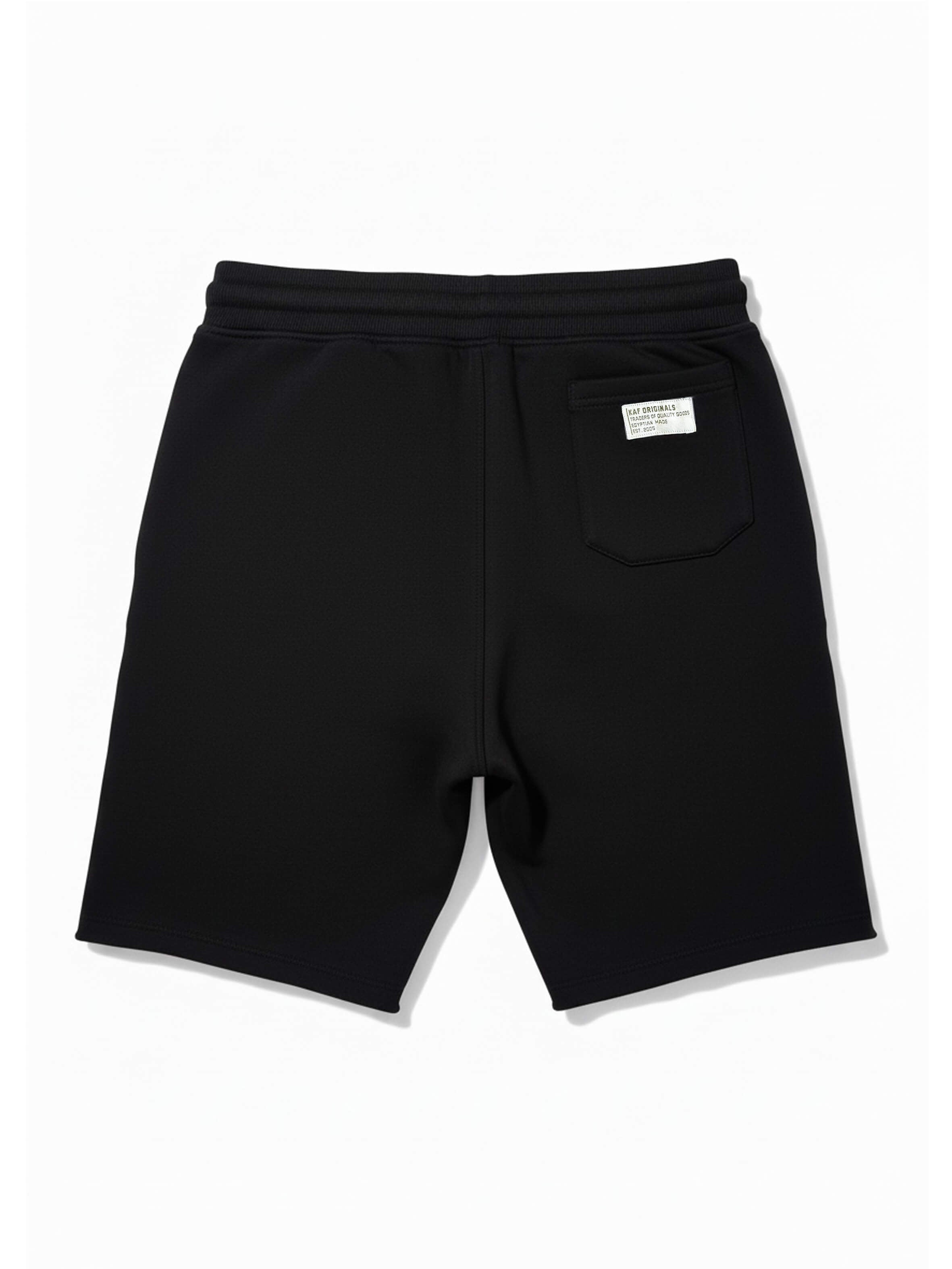 Black shorts with a small logo on a white background